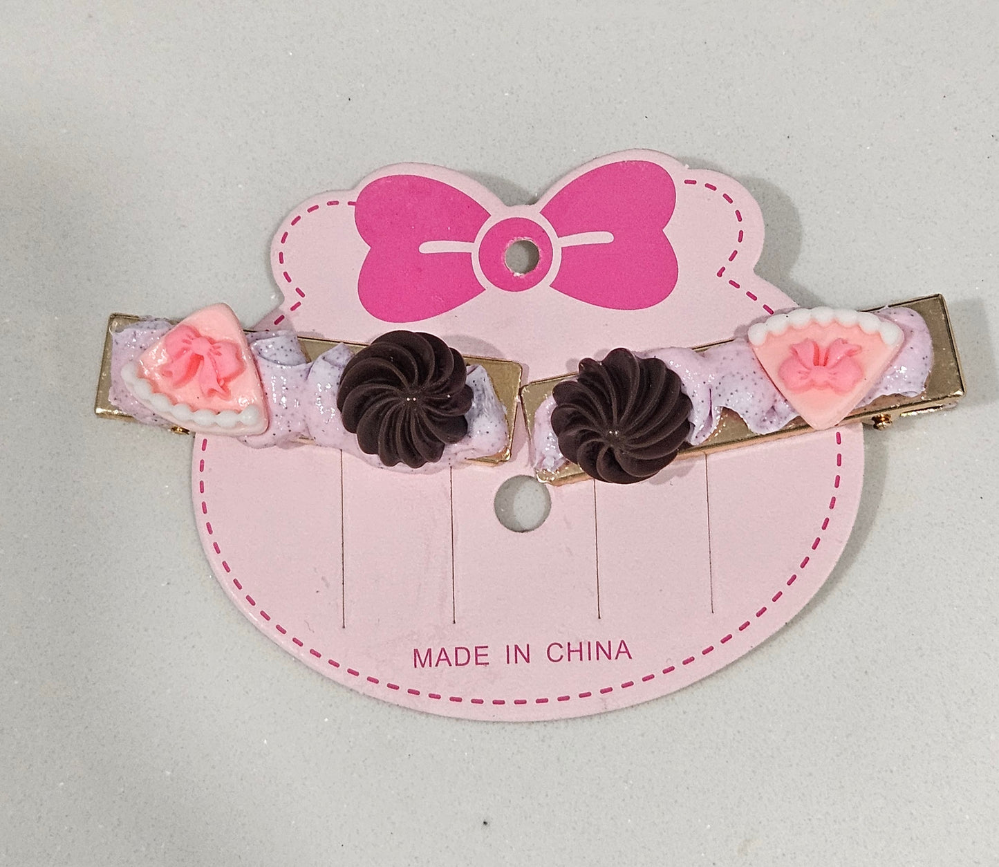 Pink chocolate alligator clips